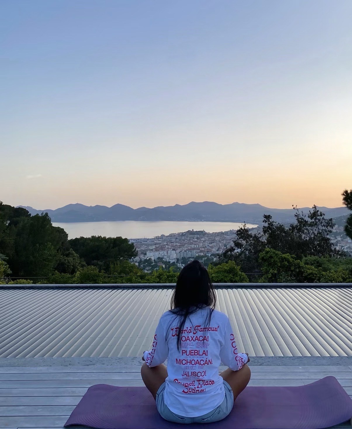 Sama meditating above Cannes at sunrise